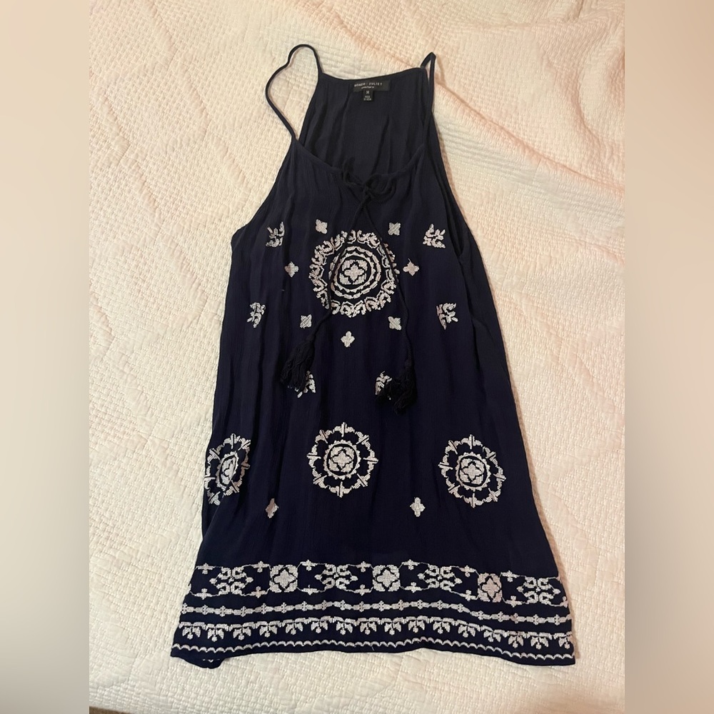 Sleeveless blue blouse